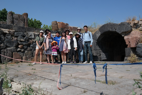 The team tours other archaeological sites to learn about the history of Armenia, such as the 4th century CE Arshakid Mausoleum.  In this photograph, Hayk Azizbekyan, Armenian project coordinator from the Institute is second from the left with black hat.  Assistant director Dr. Elvan Cobb is 3rd from the left with scarf and Director Dr. Peter J. Cobb is second from the right with green hat.